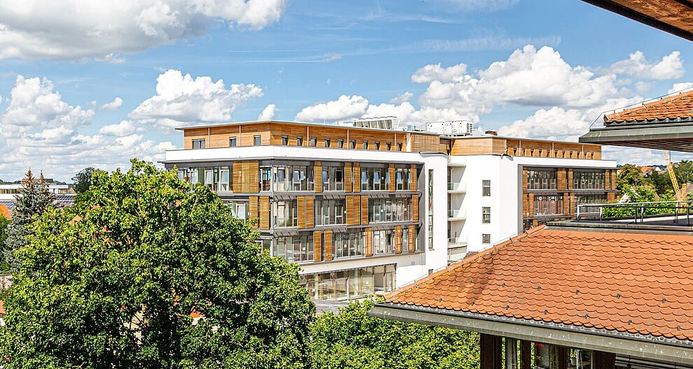 Buildings, trees, and sky.